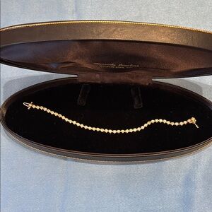 14KT YELLOW GOLD DIAMOND TENNIS BRACELET